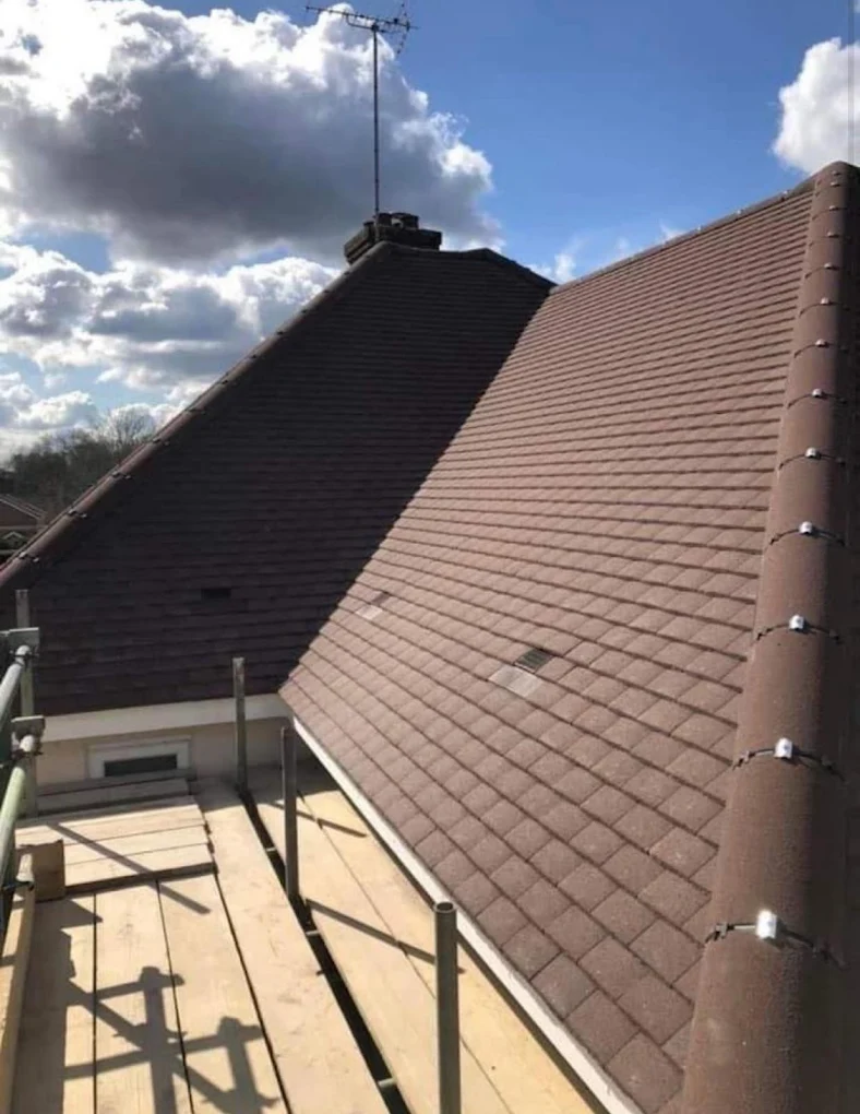 Fresh tiled roof with new ridge and dry-fix system