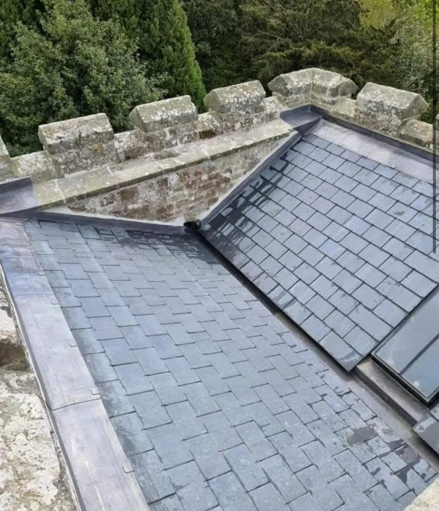 Slate roof with new lead flashing and valleys
